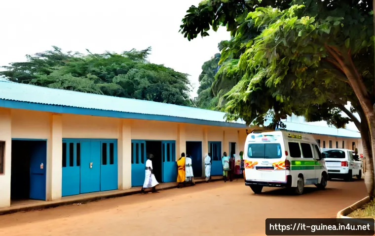 기니의 의료 환경 및 병원 정보 - Photorealistic wide-angle view of a clean public hospital in Conakry, Guinea, exterior with pale con...